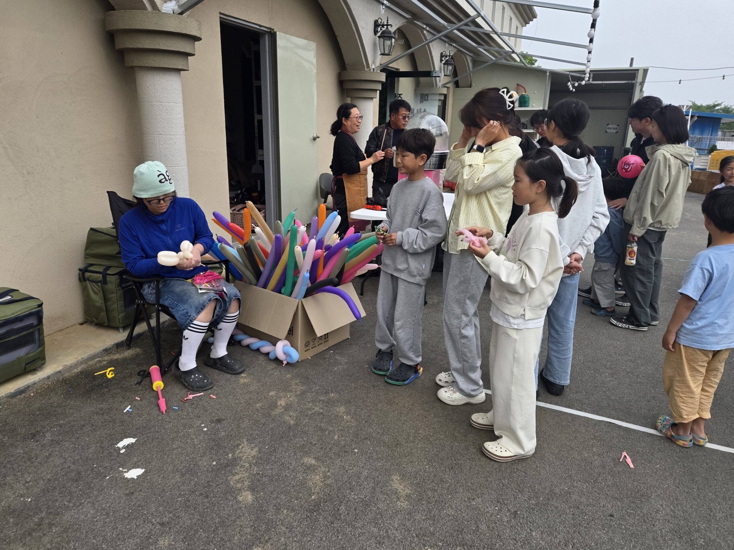 Balloon-twisting station at Naepo Camping Square Children's Day program