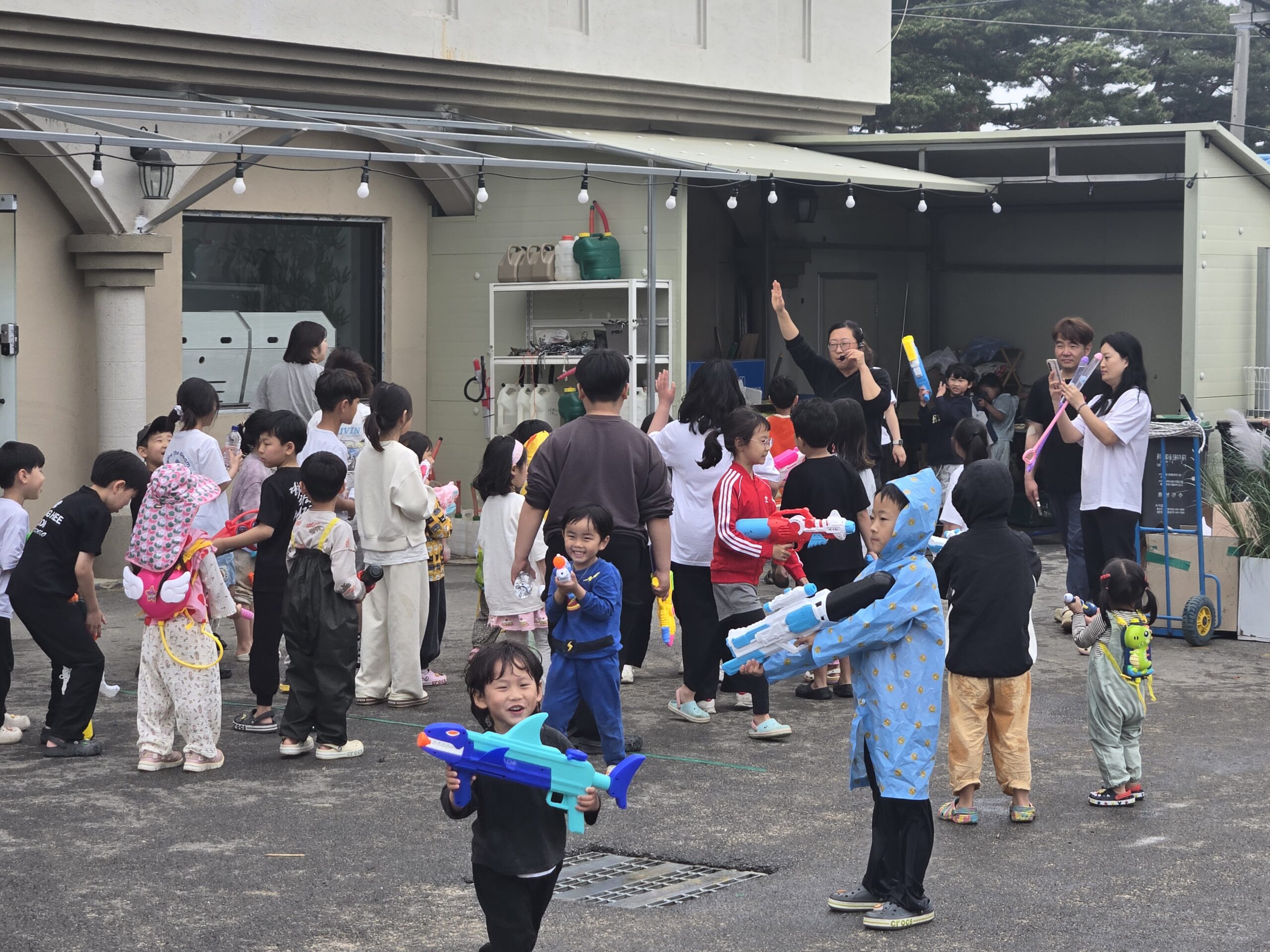 Water gun recreation game at Naepo Camping Square Children's Day activities