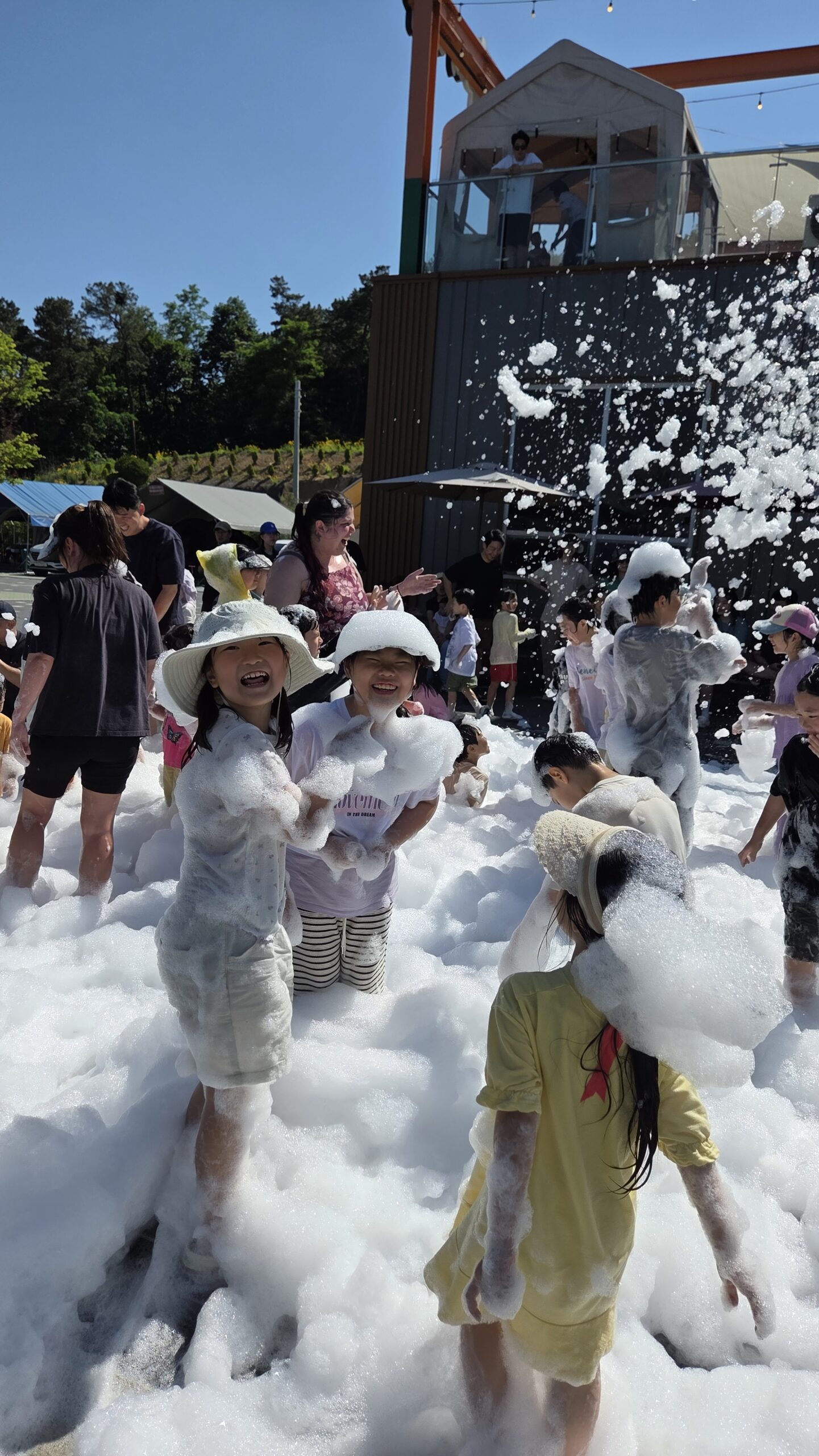 Foam party with kids playing at Choihu Camping Hanam