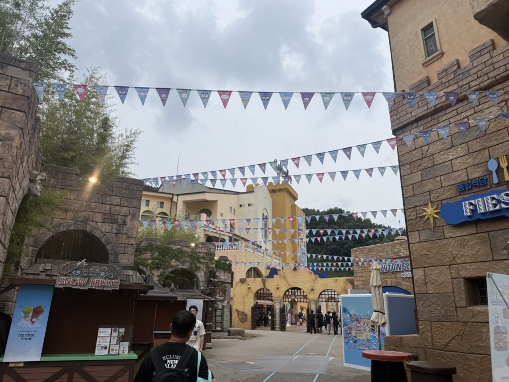 Caribbean Bay with kids entrance plaza with festive flags
