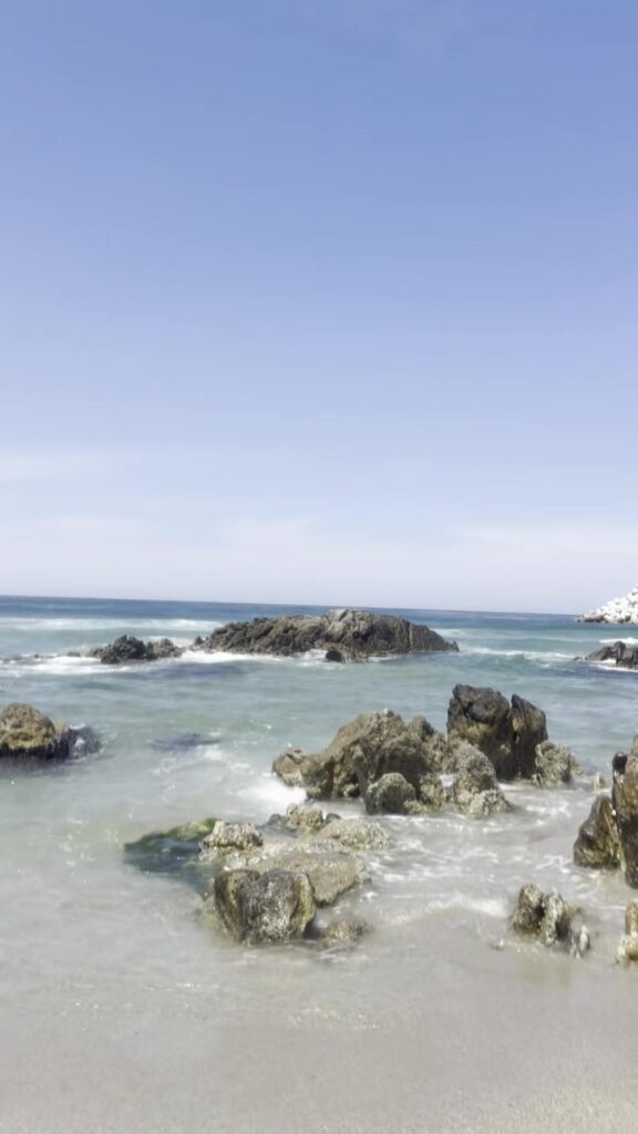 Munam Beach Samcheok rocky shore with waves breaking over dark rocks
