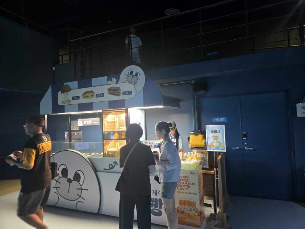 Snack cart selling Jeju tangerine bread at Aqua Planet Jeju