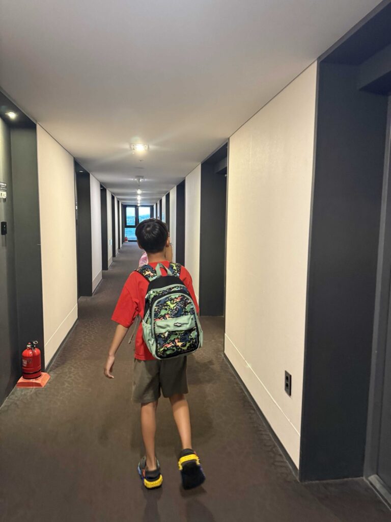 Child walking the corridor at Hotel Aircity Jeju