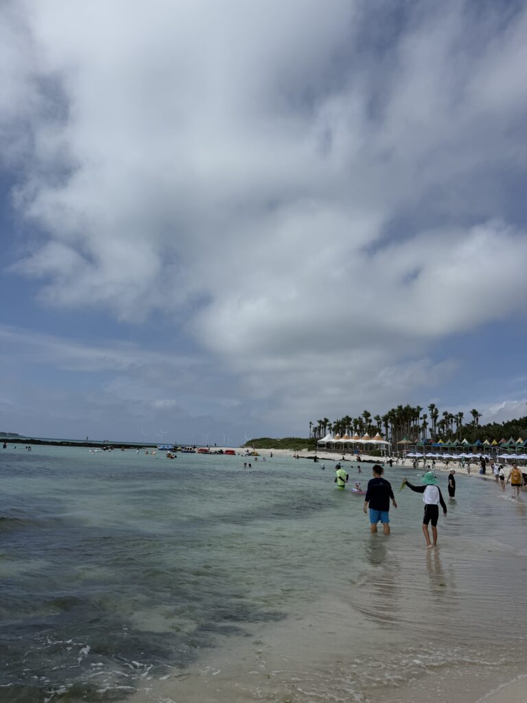 Kids playing in the shallow water at Segial Beach Jeju