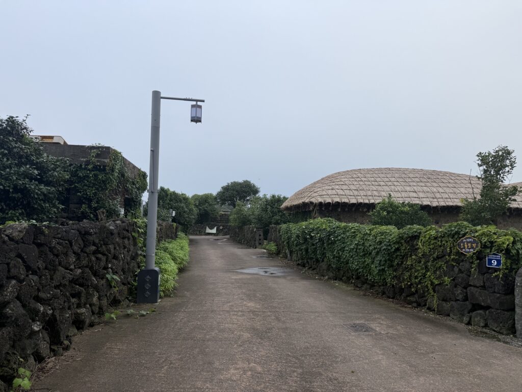 Stone-walled lane and thatched houses in Seongeup Folk Village