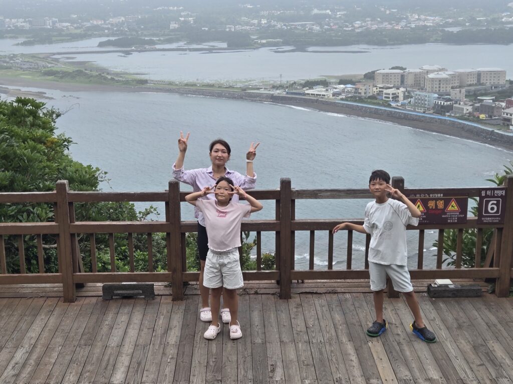Family photo at platform six near the top of Seongsan Ilchulbong