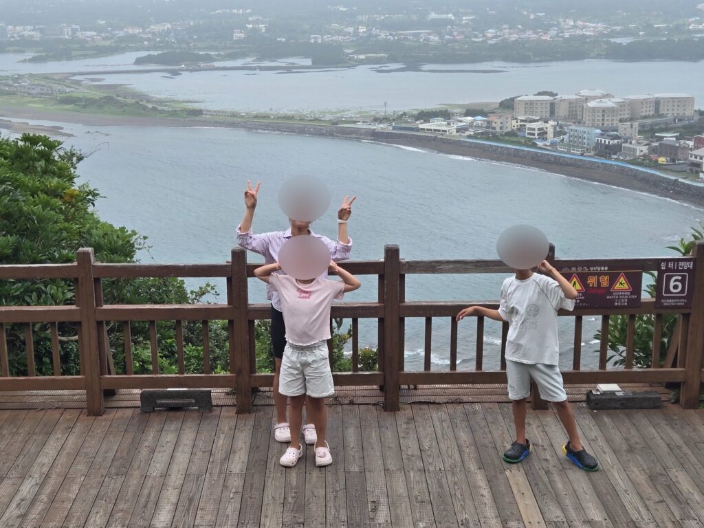 Family photo at platform six near the top of Seongsan Ilchulbong