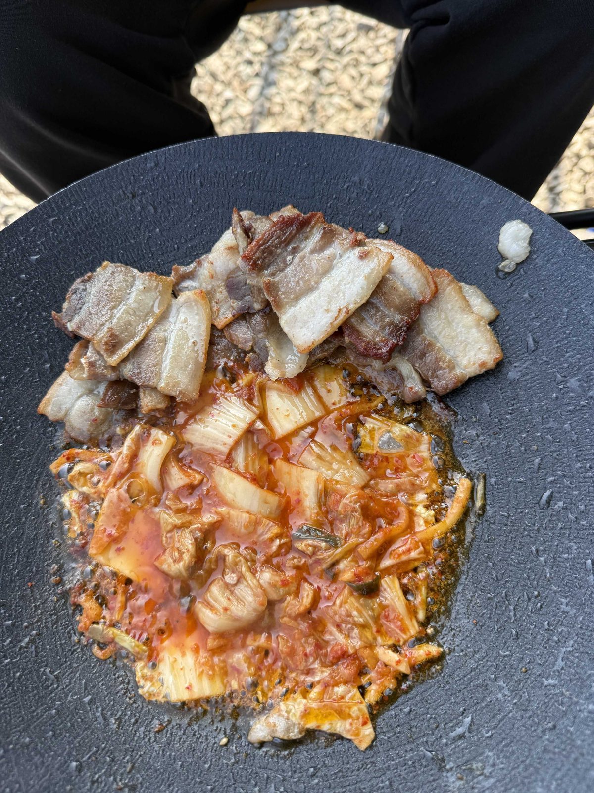 Pork belly and kimchi on the griddle