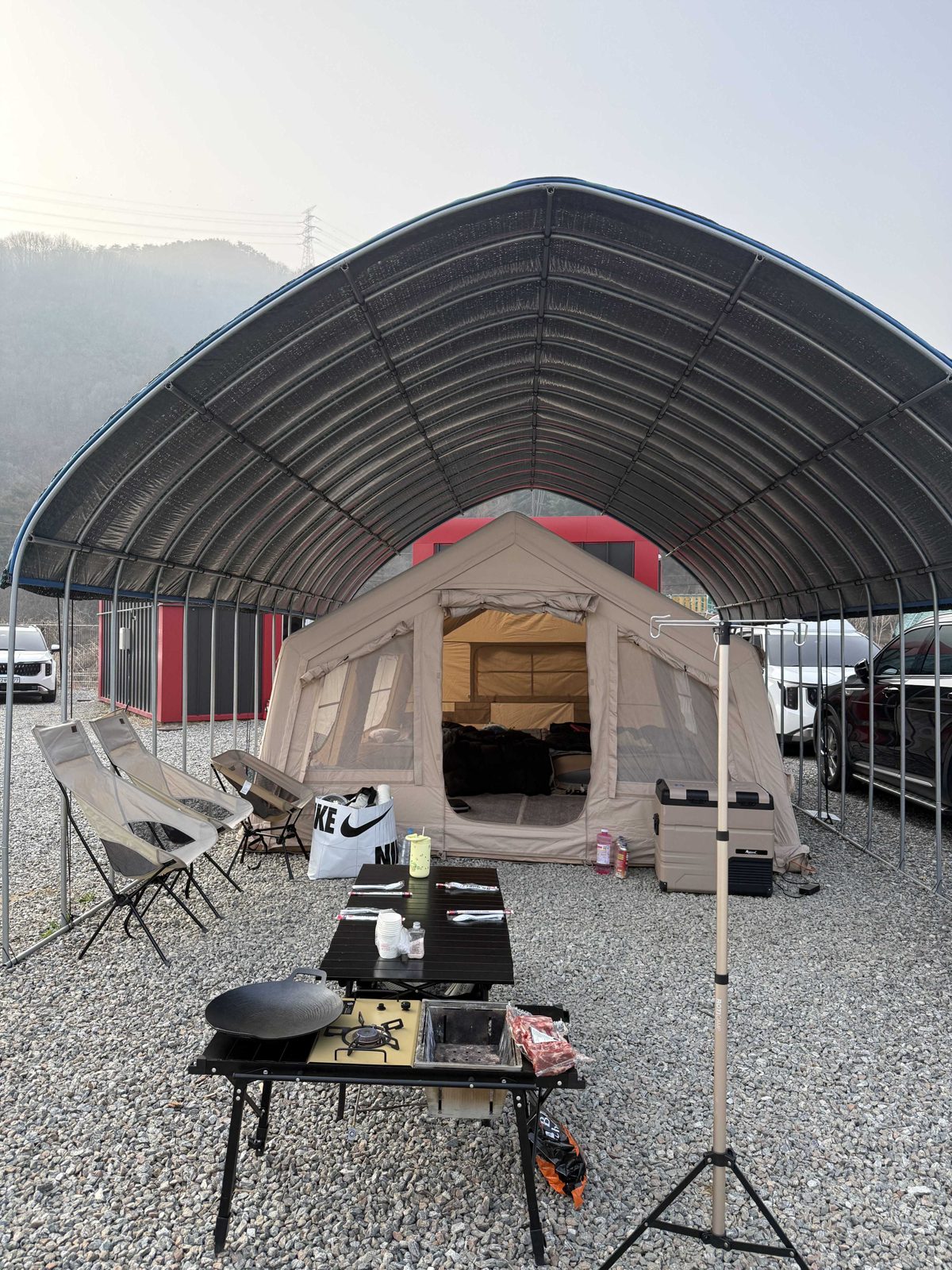 Our tent under the arched canopy roof at Mulmyeong Camp